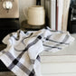 Black and beige check patterned linen kitchen towel on countertop_LaMaisonBaude