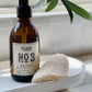 Jardin d'Agrumes French Hand soap in Amber glass bottle beside kitchen sink