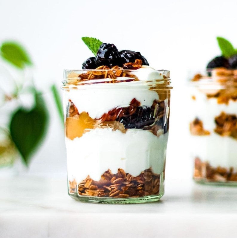 Le Parfait jam jar filled with yogurt, fruit and granola