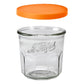 Le Parfait jam jar with orange lid against white background