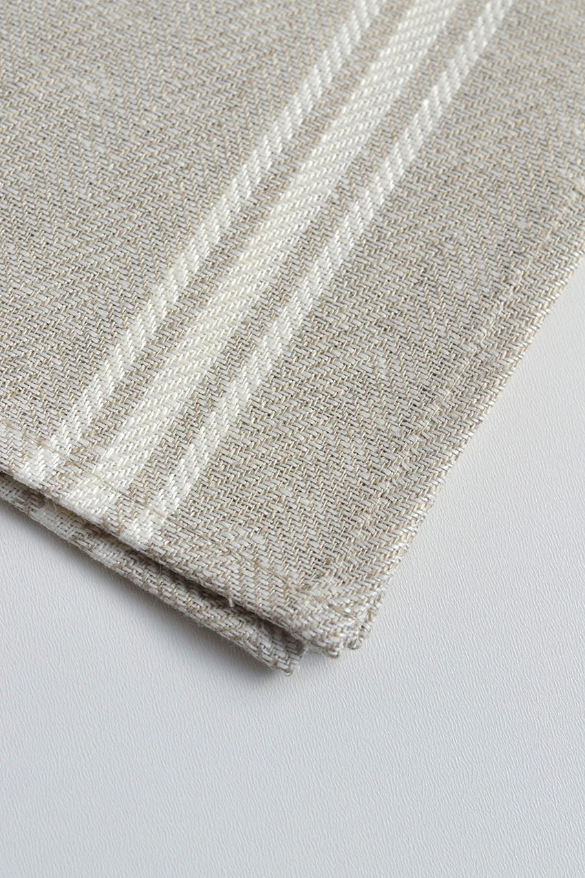 Corner of classic French Stripe linen placemat