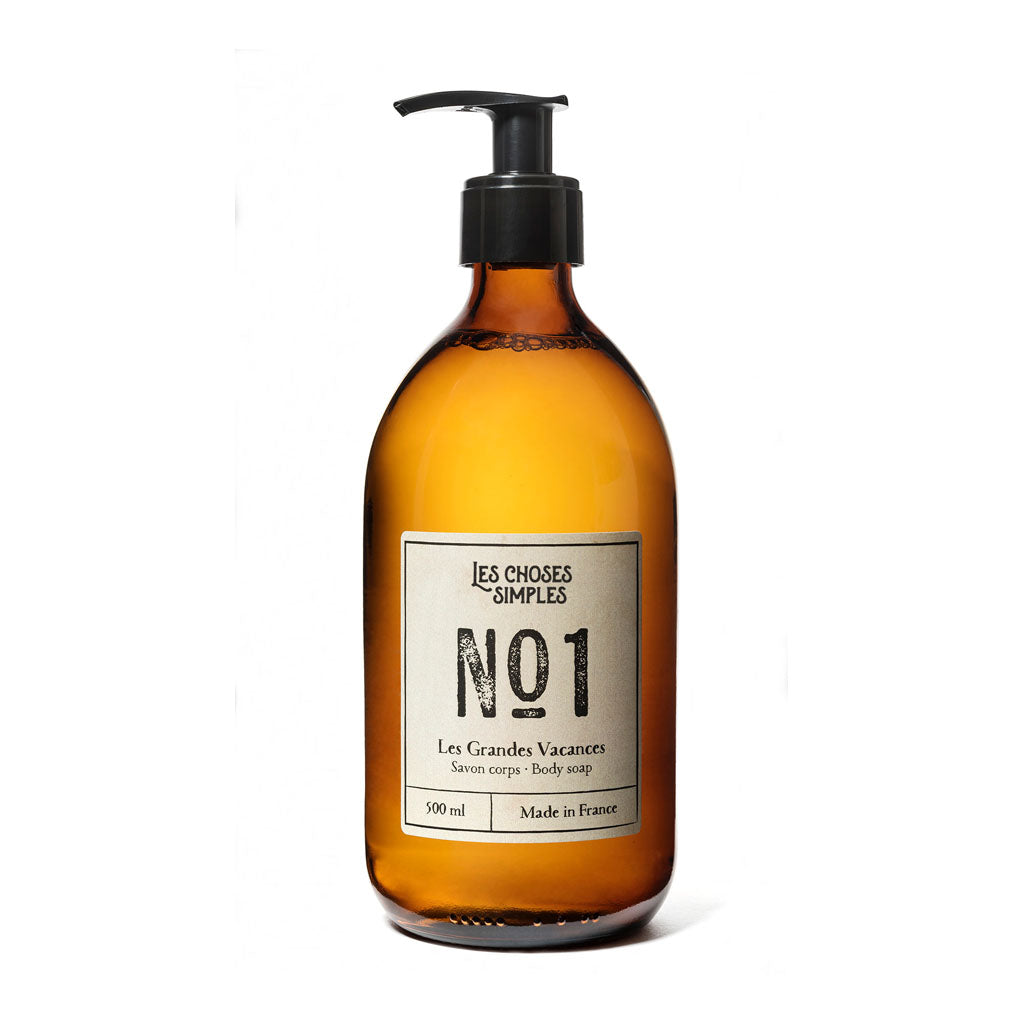 Amber glass bottle of Les Grandes Vacances French Hand Soap against white background