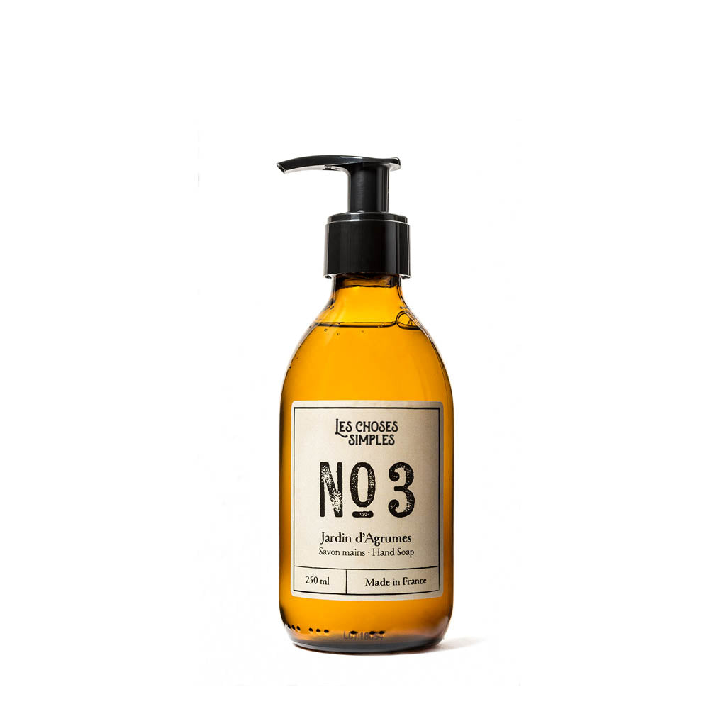 Jardin d'Agrumes French Hand soap in Amber glass bottle against white background